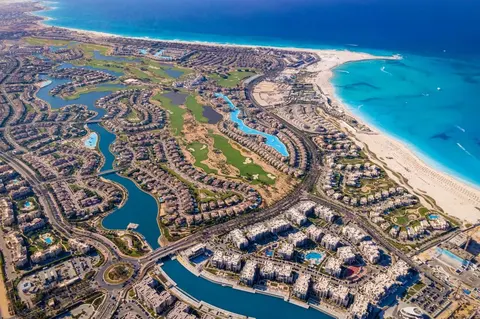 Marassi, aerial of the marina community and beachfront
